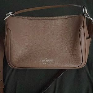 Saddle brown Coach purse.